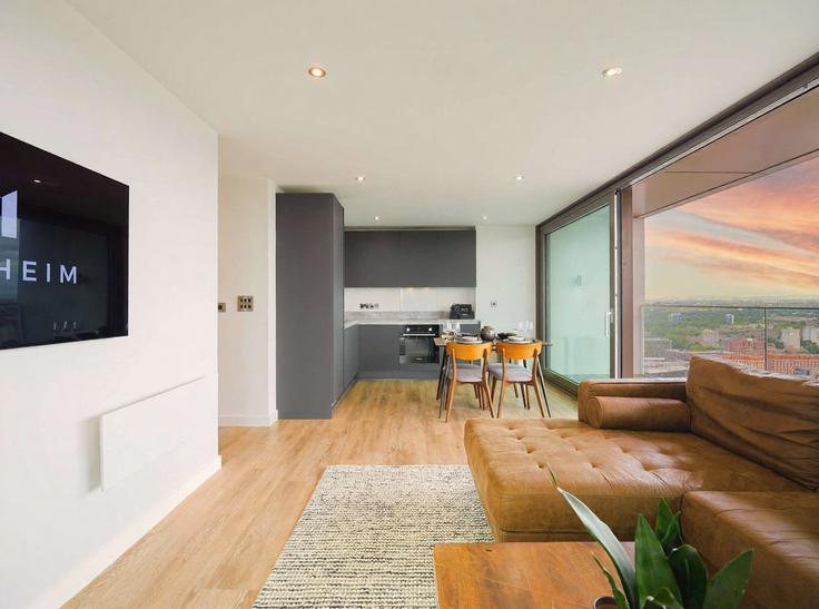 Elegante sala de estar con mobiliario moderno en un apartamento en Building Store Street - theheim - 1638425 en Manchester, Manchester