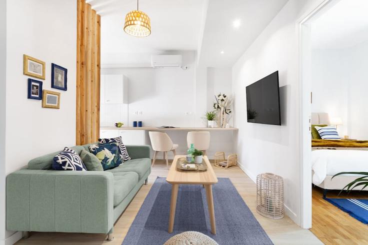 Elegantly designed living room with modern furnishings in an apartment at Building Tharipou - thehomis - 1358780 in Central Athens, Athens