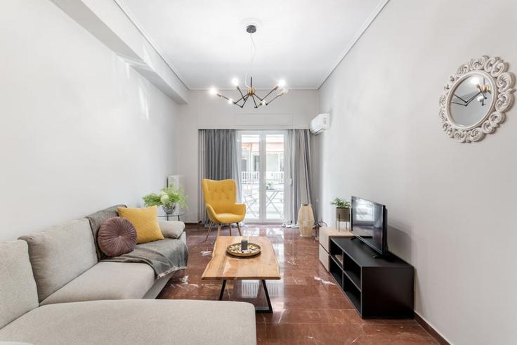 Elegantly designed living room with modern furnishings in an apartment at Building Meintani - thehomis - 1358781 in Central Athens, Athens