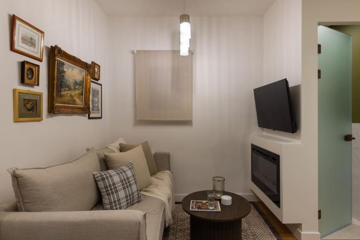 Elegantly designed living room with modern furnishings in an apartment at Building Megalou Alexandrou - thehomis - 1358908 in Central Athens, Athens