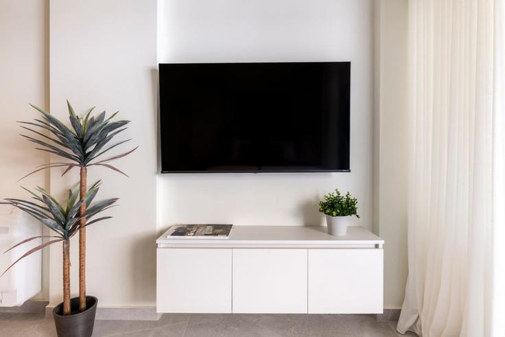 Elegantly designed living room with modern furnishings in an apartment at Building Lisimachias - thehomis - 1358936 in Central Athens, Athens