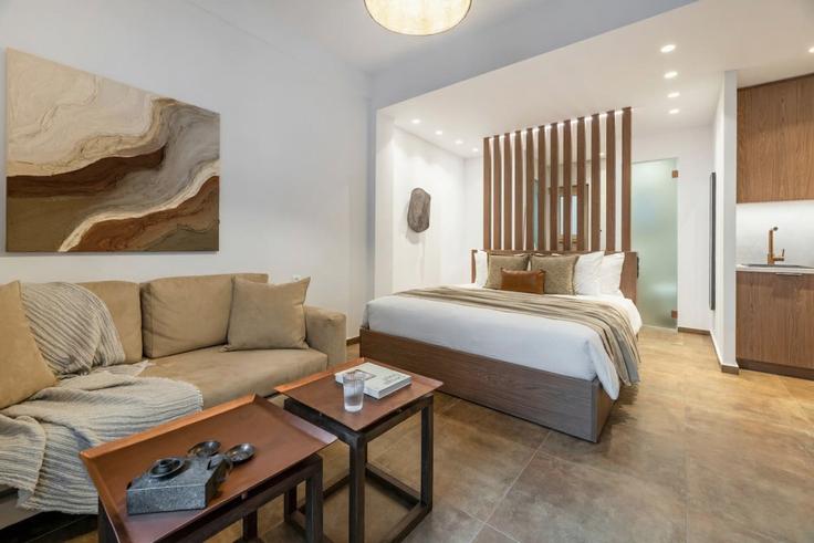 Elegante sala de estar con mobiliario moderno en un apartamento en Building Aglavrou - thehomis - 1533823 en Central Athens, Athens Elegante sala de estar con mobiliario moderno en un apartamento en Building Aglavrou - thehomis - 1533823 en Central Athens, Athens
