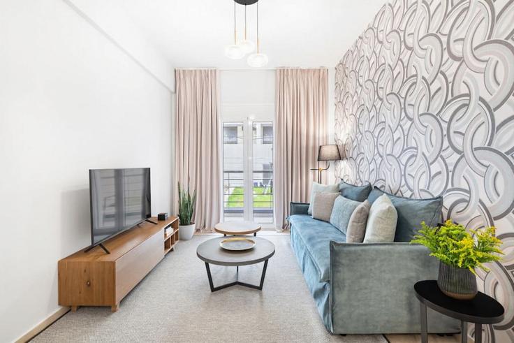 Salle de séjour élégante avec mobilier moderne dans un appartement à Building Iosif Ton Rogon - thehomis - 1358805 à Central Athens, Athens Salle de séjour élégante avec mobilier moderne dans un appartement à Building Iosif Ton Rogon - thehomis - 1358805 à Central Athens, Athens