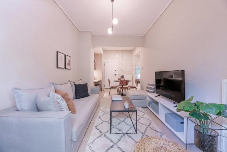 Building Stirieon - thehomis - 1358948 adresindeki bir dairede modern mobilyalarla zarif bir şekilde tasarlanmış oturma odası Central Athens, Athens Building Stirieon - thehomis - 1358948 adresindeki bir dairede modern mobilyalarla zarif bir şekilde tasarlanmış oturma odası Central Athens, Athens