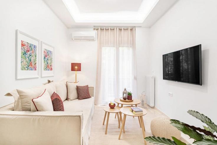 Elegantly designed living room with modern furnishings in an apartment at Building Kifisodotou - thehomis - 1358792 in Central Athens, Athens Elegantly designed living room with modern furnishings in an apartment at Building Kifisodotou - thehomis - 1358792 in Central Athens, Athens