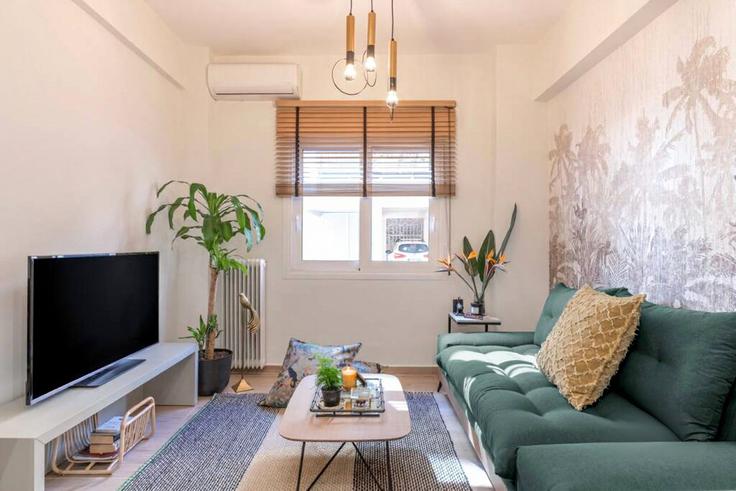 Elegantly designed living room with modern furnishings in an apartment at Building Pinotsi - thehomis - 1358834 in Central Athens, Athens