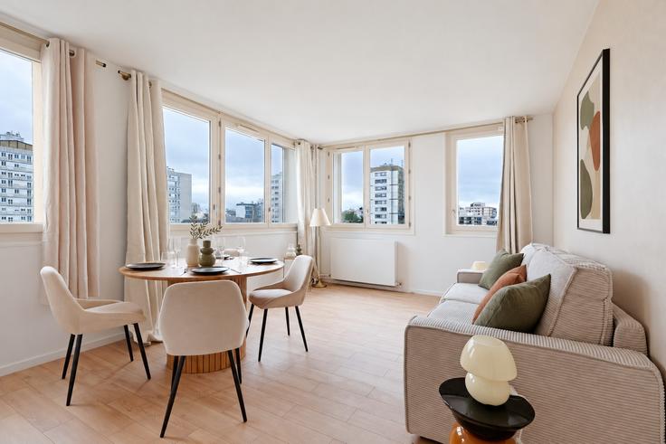 Elegante sala de estar con mobiliario moderno en un apartamento en Building Rue Henri Ribière - thekonciergerie - 1295744 en 19th arrondissement, Paris Elegante sala de estar con mobiliario moderno en un apartamento en Building Rue Henri Ribière - thekonciergerie - 1295744 en 19th arrondissement, Paris