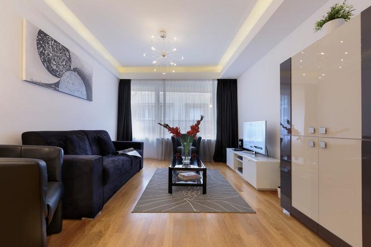 Salle de séjour élégante avec mobilier moderne dans un appartement à Building Rue de Strasbourg - thequeenluxuryapartments - 1045280 - LUX à Luxembourg, Luxembourg Salle de séjour élégante avec mobilier moderne dans un appartement à Building Rue de Strasbourg - thequeenluxuryapartments - 1045280 - LUX à Luxembourg, Luxembourg