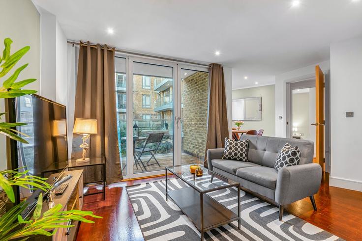 London London Borough of Tower HamletsのBuilding Commercial Road - thesquare-serviced-apartments - 1510936のアパートメントにある、モダンな家具を備えたエレガントなデザインのリビングルーム London London Borough of Tower HamletsのBuilding Commercial Road - thesquare-serviced-apartments - 1510936のアパートメントにある、モダンな家具を備えたエレガントなデザインのリビングルーム