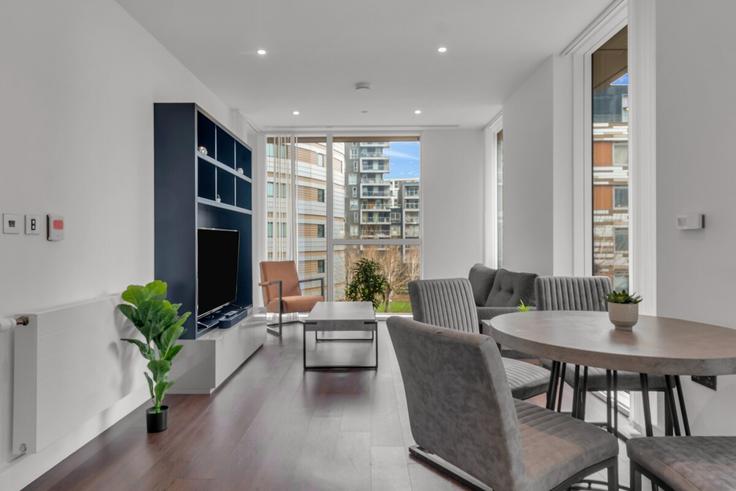 London London Borough of Tower HamletsのBuilding Harbour Way - thesquare-serviced-apartments - 1271975 - LONのアパートメントにある、モダンな家具を備えたエレガントなデザインのリビングルーム