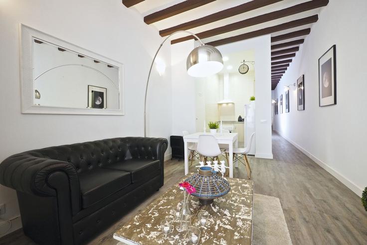 Salle de séjour élégante avec mobilier moderne dans un appartement à Building Carrer del Comte Borrell - thewhiteflatsbcn - 1470204 à Eixample, Barcelona Salle de séjour élégante avec mobilier moderne dans un appartement à Building Carrer del Comte Borrell - thewhiteflatsbcn - 1470204 à Eixample, Barcelona