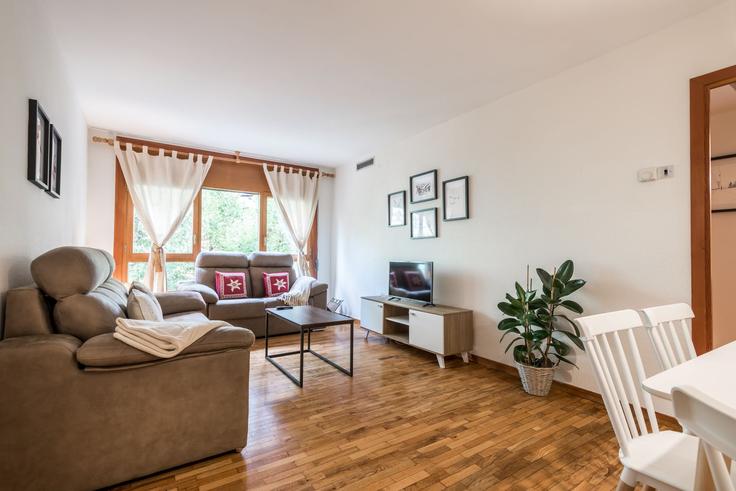 Sala de estar elegantemente projetada com móveis modernos em um apartamento no Building Calle Perimetrau - totiaran-sl - 1336203 em Baqueira, Baqueira Sala de estar elegantemente projetada com móveis modernos em um apartamento no Building Calle Perimetrau - totiaran-sl - 1336203 em Baqueira, Baqueira