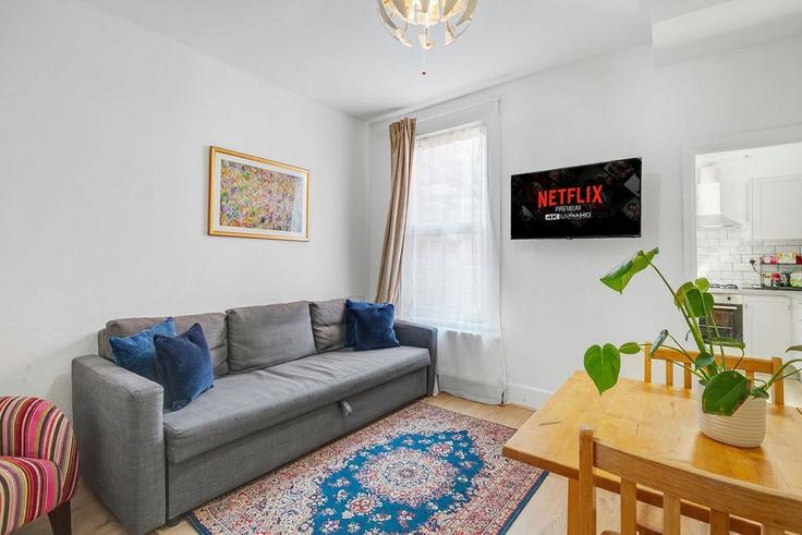 Elegantly designed living room with modern furnishings in an apartment at Building Greenfield Road - tottenham-abode - 1557650 in London Borough of Haringey, London