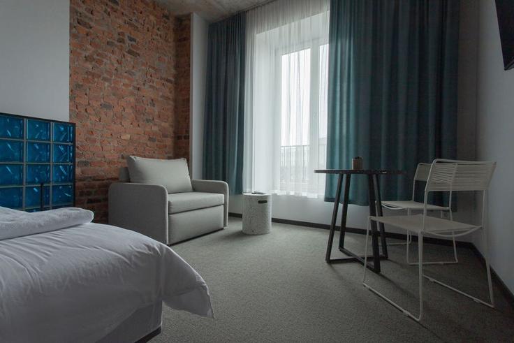 Elegante sala de estar con mobiliario moderno en un apartamento en Building E. Ožeškienės gatvė - uab-sd-holdings - 1571129 en Kaunas, Kaunas