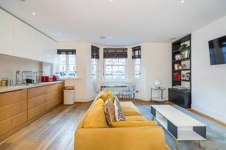 Salle de séjour élégante avec mobilier moderne dans un appartement à Building Great Portland Street - udoma-limited - 1438294 à City of Westminster, London