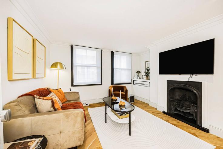 Elegante sala de estar con mobiliario moderno en un apartamento en Building Avery Row - udoma-limited - 1438293 en City of Westminster, London