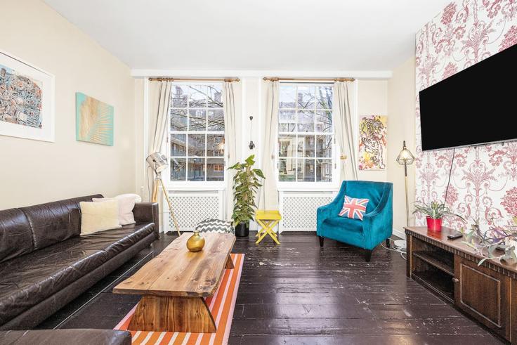 Elegantly designed living room with modern furnishings in an apartment at Building Beatty Street - udoma-limited - 1438301 in London Borough of Camden, London