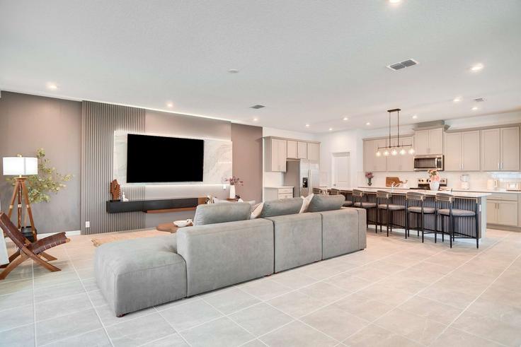 Sala de estar elegantemente projetada com móveis modernos em um apartamento no Building Salty Winds Way - une-homes - 1351733 em Four Corners, Four Corners