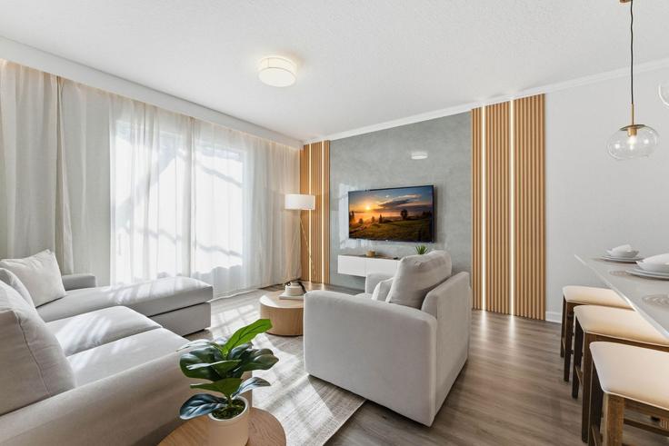 Four Corners Four CornersのBuilding Ocean Course Avenue - une-homes - 1372315のアパートメントにある、モダンな家具を備えたエレガントなデザインのリビングルーム