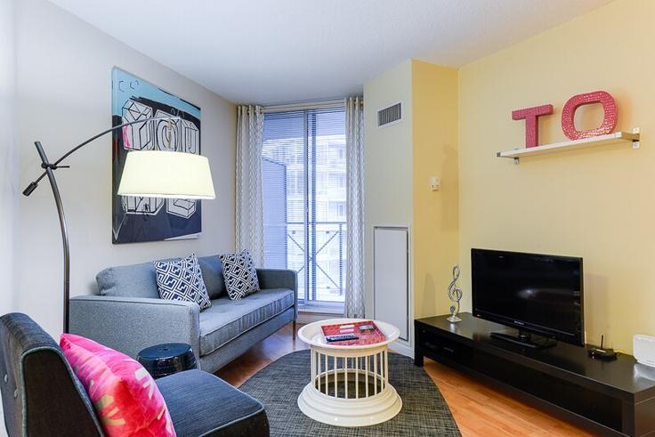 Elegantly designed living room with modern furnishings in an apartment at Building Adelaide Street West - urbanflatstoronto - 1034876 - TOR in Old Toronto, Toronto Elegantly designed living room with modern furnishings in an apartment at Building Adelaide Street West - urbanflatstoronto - 1034876 - TOR in Old Toronto, Toronto
