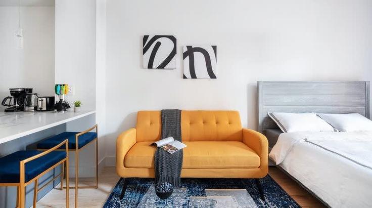 Salle de séjour élégante avec mobilier moderne dans un appartement à Building East 84th Street - urbanfurnished-guesty - 1021933 - NYC à Manhattan, New York Salle de séjour élégante avec mobilier moderne dans un appartement à Building East 84th Street - urbanfurnished-guesty - 1021933 - NYC à Manhattan, New York