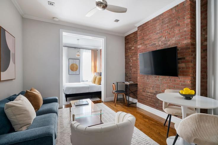 Manhattan, New York에 위치한 Building Mott Street - urbanfurnished-guesty - 1474771 유닛의 세련된 인테리어가 돋보이는 거실