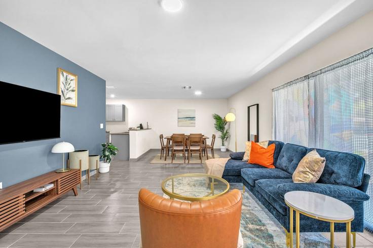Elegantly designed living room with modern furnishings in an apartment at Building Northwest 32nd Street - vacarya-1 - 1697802 in Miami, Miami Elegantly designed living room with modern furnishings in an apartment at Building Northwest 32nd Street - vacarya-1 - 1697802 in Miami, Miami