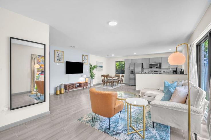 Elegantly designed living room with modern furnishings in an apartment at Building Northwest 32nd Street - vacarya-1 - 1697794 in Miami, Miami Elegantly designed living room with modern furnishings in an apartment at Building Northwest 32nd Street - vacarya-1 - 1697794 in Miami, Miami