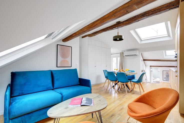 Paris 5th arrondissementのBuilding Rue Maître Albert - vacation-rentals - 1542212のアパートメントにある、モダンな家具を備えたエレガントなデザインのリビングルーム Paris 5th arrondissementのBuilding Rue Maître Albert - vacation-rentals - 1542212のアパートメントにある、モダンな家具を備えたエレガントなデザインのリビングルーム