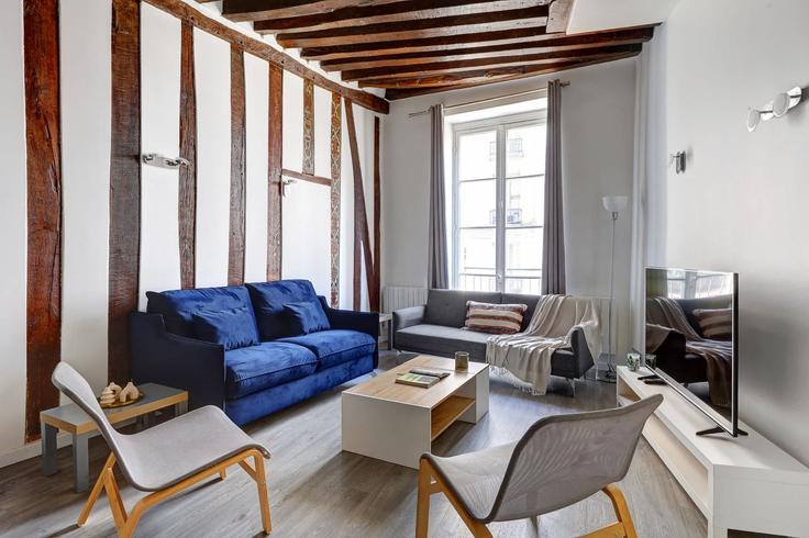 Salle de séjour élégante avec mobilier moderne dans un appartement à Building Rue de l'Echaudé - vacation-rentals - 1542214 à 6th arrondissement, Paris Salle de séjour élégante avec mobilier moderne dans un appartement à Building Rue de l'Echaudé - vacation-rentals - 1542214 à 6th arrondissement, Paris