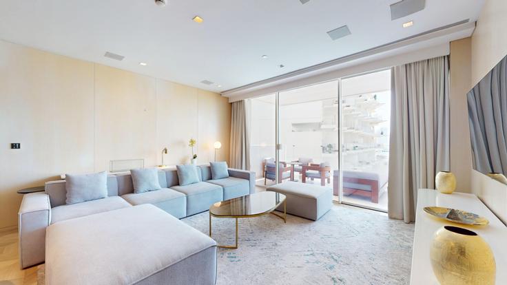 Elegantly designed living room with modern furnishings in an apartment at Building Palm Jumeirah Rd - vacationer - 1046588 in The Palm Jumeirah, Dubai Elegantly designed living room with modern furnishings in an apartment at Building Palm Jumeirah Rd - vacationer - 1046588 in The Palm Jumeirah, Dubai