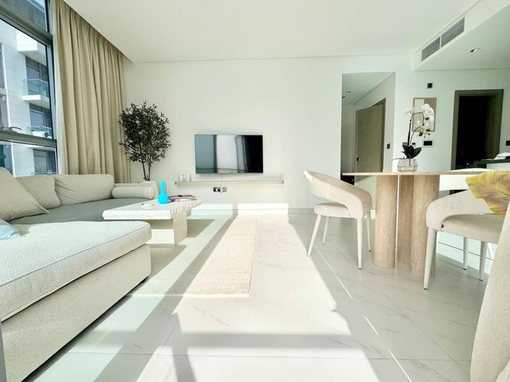 Elegantly designed living room with modern furnishings in an apartment at Building Tariaq Bedon Esm - vacationer - 1046785 - DXB in Dubai, Dubai Elegantly designed living room with modern furnishings in an apartment at Building Tariaq Bedon Esm - vacationer - 1046785 - DXB in Dubai, Dubai