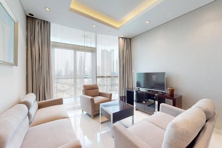 Burj Khalifa, Dubai 소재 Building Tariaq Bedon Esm - vacationer - 1366718 유닛에 마련된, 현대적인 가구로 꾸며진 우아한 디자인의 거실