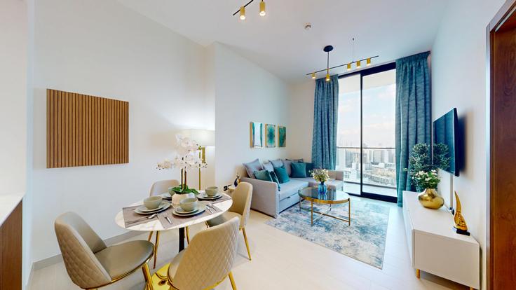 Elegante sala de estar con mobiliario moderno en un apartamento en Building Assel Blvd - vacationer - 1369833 en Jumeirah Village, Dubai Elegante sala de estar con mobiliario moderno en un apartamento en Building Assel Blvd - vacationer - 1369833 en Jumeirah Village, Dubai