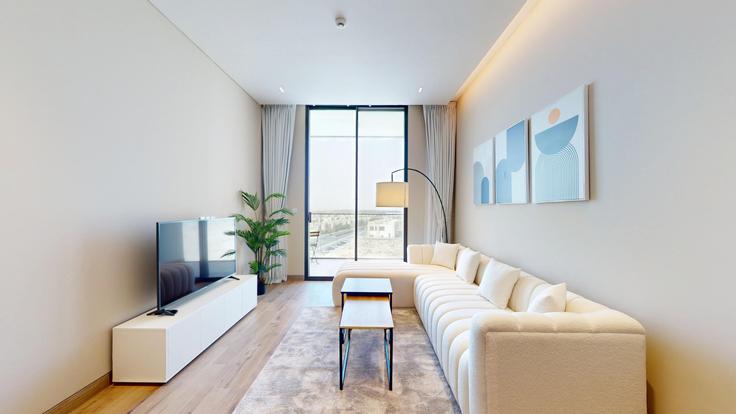 Dubai Wadi Al Safa 3のBuilding Tariaq Bedon Esm - vacationer - 1490232のアパートメントにある、モダンな家具を備えたエレガントなデザインのリビングルーム