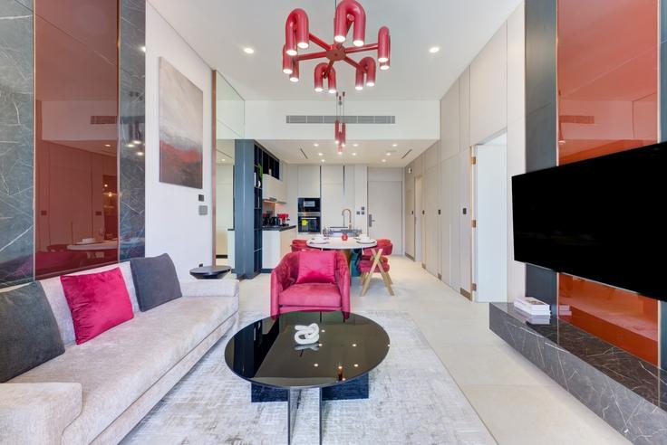 Al Satwa, Dubai에 위치한 Building 41st Street - vacationer - 1697132 유닛의 세련된 인테리어가 돋보이는 거실 Al Satwa, Dubai에 위치한 Building 41st Street - vacationer - 1697132 유닛의 세련된 인테리어가 돋보이는 거실