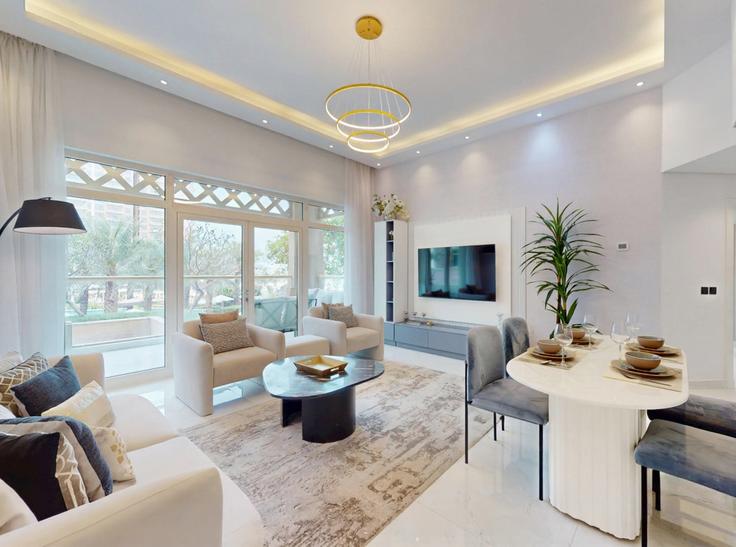 Salle de séjour élégante avec mobilier moderne dans un appartement à Building Tariaq Bedon Esm - vacationer - 1490231 à The Palm Jumeirah, Dubai Salle de séjour élégante avec mobilier moderne dans un appartement à Building Tariaq Bedon Esm - vacationer - 1490231 à The Palm Jumeirah, Dubai