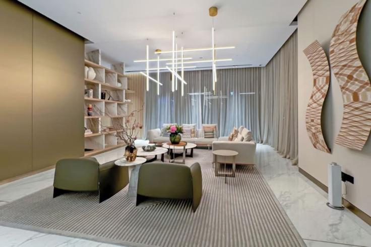 Sala de estar elegantemente projetada com móveis modernos em um apartamento no Building Marasi Drive - vacaylettingsvacationshomesrental - 1340554 em Business Bay, Dubai Sala de estar elegantemente projetada com móveis modernos em um apartamento no Building Marasi Drive - vacaylettingsvacationshomesrental - 1340554 em Business Bay, Dubai