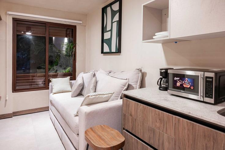 Bucerías, Bucerías에 위치한 Building Heroes Nayaritas - valkka-management - 1318202 아파트의 세련된 인테리어가 돋보이는 거실