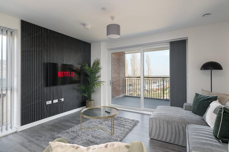 Milton Keynes Milton KeynesのBuilding Canal Street - valore-living - 1471453のアパートメントにある、モダンな家具を備えたエレガントなデザインのリビングルーム