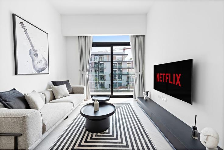 Elegantly designed living room with modern furnishings in an apartment at Building Tariaq Bedon Esm - vayk-vacation-homes-rental-llc - 1257260 - DXB in Jumeirah Village, Dubai