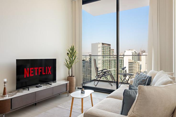 Dubai Jumeirah VillageのBuilding Street 5 - vayk-vacation-homes-rental-llc - 1257304 - DXBのアパートメントにある、モダンな家具を備えたエレガントなデザインのリビングルーム