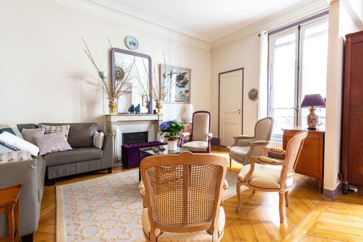 Building Rue Saint-Placide - veeve - 398468 - PAR adresindeki bir dairede modern mobilyalarla zarif bir şekilde tasarlanmış oturma odası 6th arrondissement, Paris