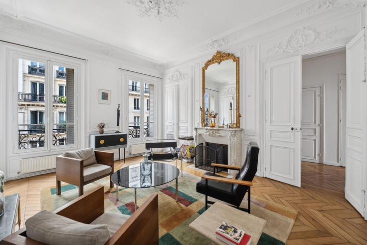 Elegante sala de estar con mobiliario moderno en un apartamento en Building Rue de Rome - veeve - 1281174 - PAR en 8th arrondissement, Paris Elegante sala de estar con mobiliario moderno en un apartamento en Building Rue de Rome - veeve - 1281174 - PAR en 8th arrondissement, Paris