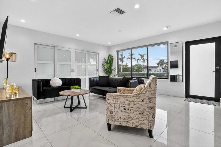Elegantly designed living room with modern furnishings in an apartment at Building Northeast 6th Avenue - ventur - 1372317 in Miami, Miami