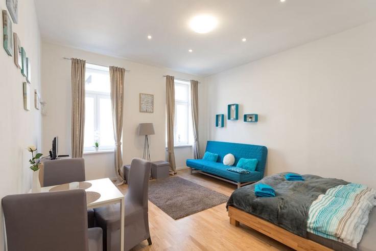 Elegante sala de estar con mobiliario moderno en un apartamento en Building Rueppgasse - viennainvites - 1507318 en Vienna, Vienna Elegante sala de estar con mobiliario moderno en un apartamento en Building Rueppgasse - viennainvites - 1507318 en Vienna, Vienna