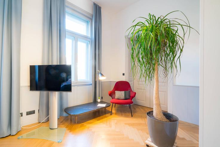 Salle de séjour élégante avec mobilier moderne dans un appartement à Building Auerspergstraße - viennaresidences - 1049304 - VIE à Vienna, Vienna