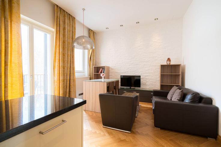Salle de séjour élégante avec mobilier moderne dans un appartement à Building Auerspergstraße - viennaresidences - 1049307 - VIE à Vienna, Vienna