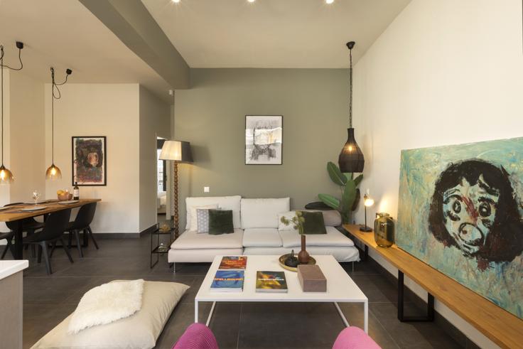 Elegantly designed living room with modern furnishings in an apartment at Building Odissea Androutsou - vilaman-ike-avantio - 1224519 - ATH in Central Athens, Athens