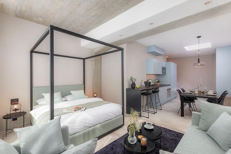 Sala de estar elegantemente projetada com móveis modernos em um apartamento no Building Nauenstrasse - visionapartments - 1365978 em Basel, Basel Sala de estar elegantemente projetada com móveis modernos em um apartamento no Building Nauenstrasse - visionapartments - 1365978 em Basel, Basel